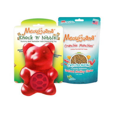 Colorful gummy bear-shaped cat toy beside a bag of Meowijuana® Crunchie Munchie® Seafood Treats, perfect for interactive feline play