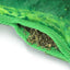 Close-up of the dill pickle dog toy showing the refillable Juananip pocket filled with dried catnip.