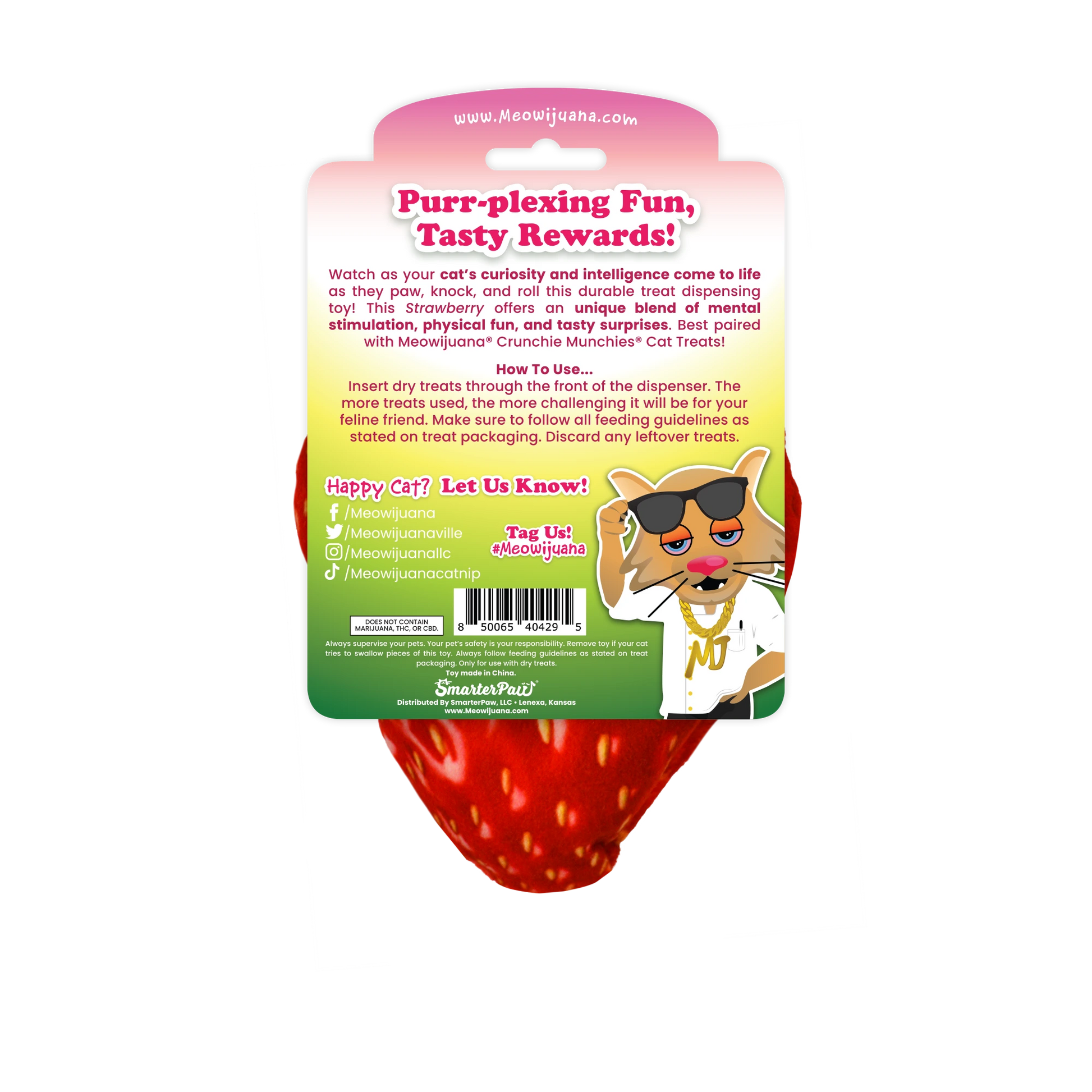 Bright red strawberry-shaped cat toy beside a bag of Meowijuana® Crunchie Munchie® Chicken Treats, perfect for interactive play.